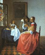 JanVermeer A Lady and Two Gentlemen painting